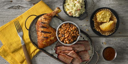 BBQ Entree meat, beans, mashed potatoes, sauce and a cornbread muffin